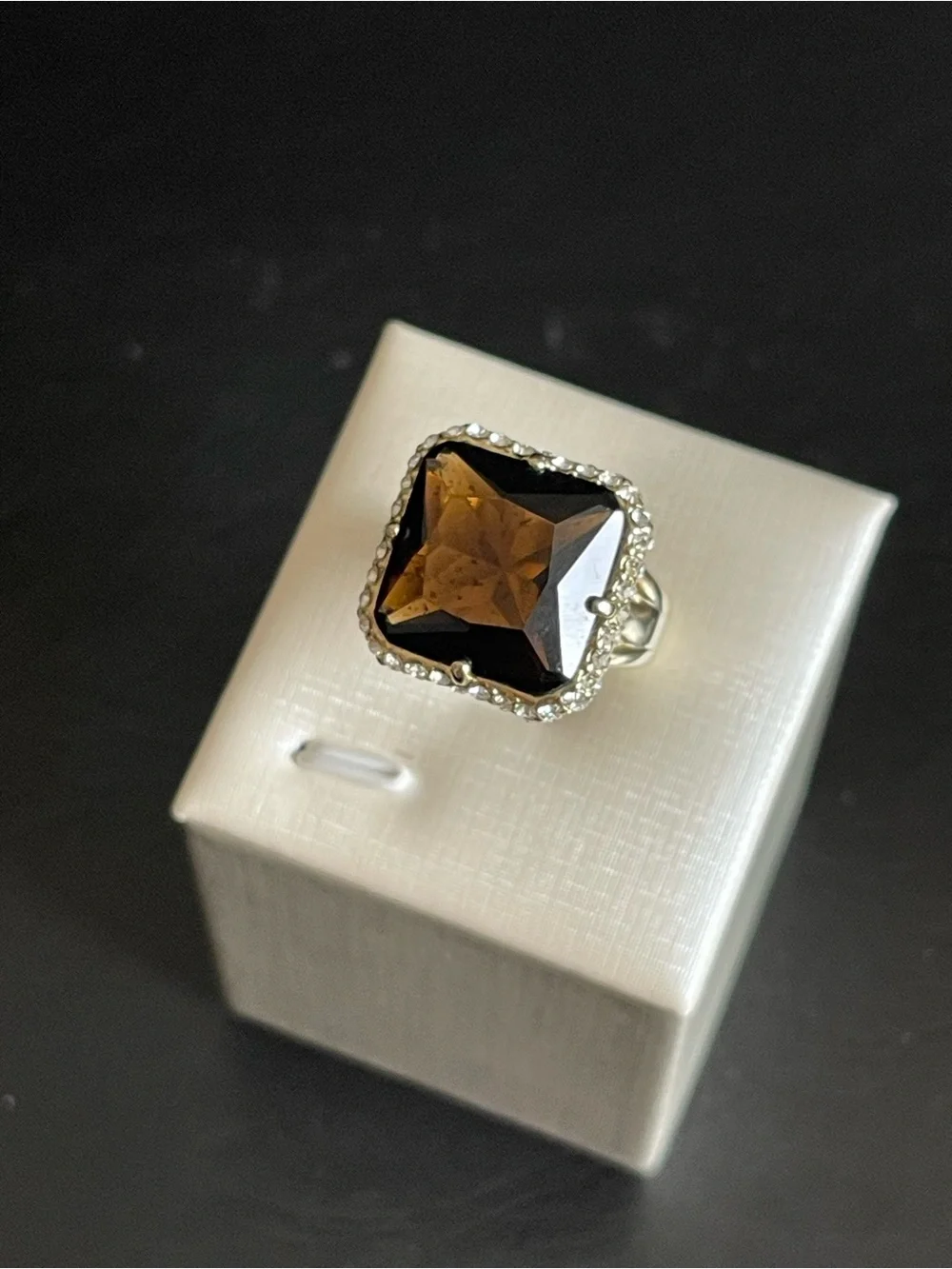 New gold tone simulated smoky quartz ring.